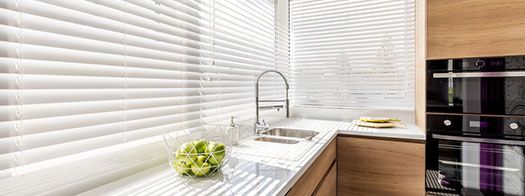 High-quality blinds installed in a kitchen
